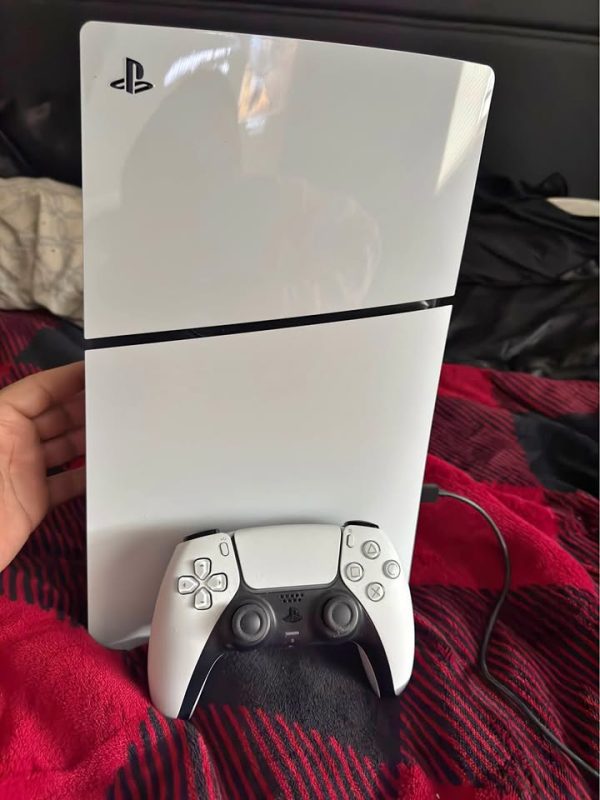 Digital PlayStation five with charging station and two controllers
